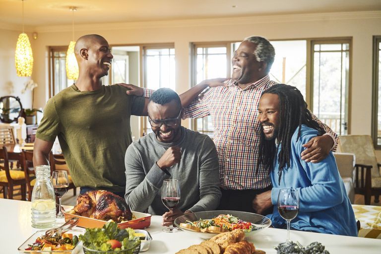 family laughing thanksgiving
