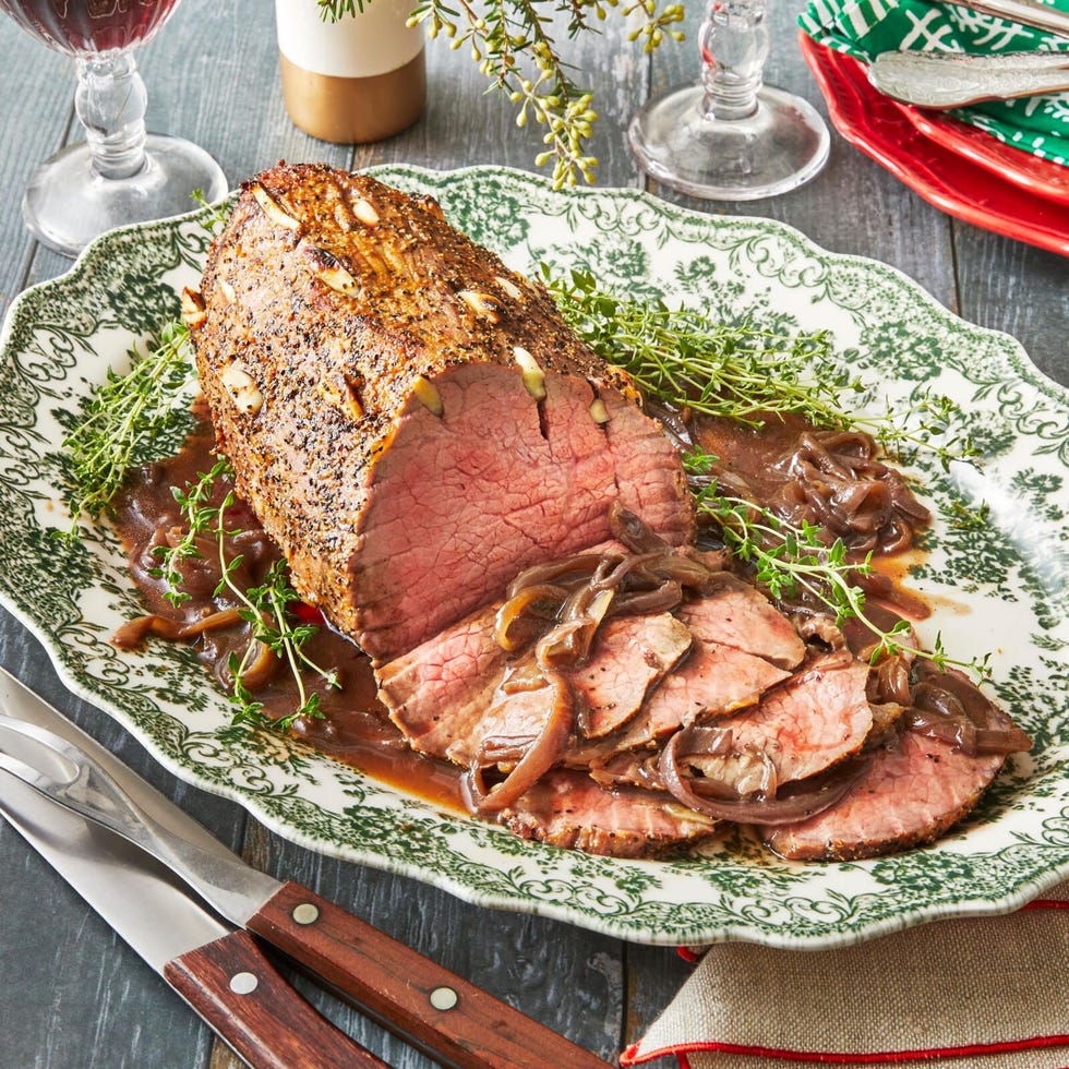 roast beef and herbs on platter