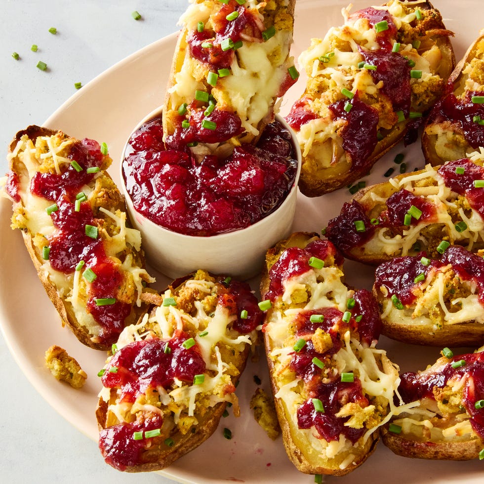 potato skins stuffed with mashed potatoes, stuffing, turkey, and topped with cranberry sauce