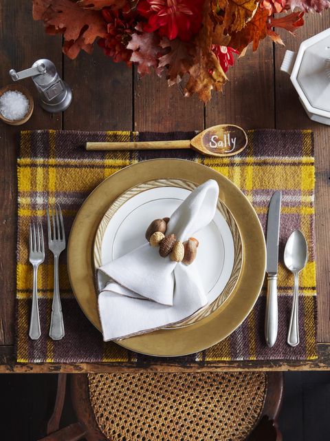 tablescape with vintage finds, table setting, diy antique wool blanket made into placemats, vintage wooden spoons used as placecards diy napkin ring made with nuts 2093 country living makers dozen
