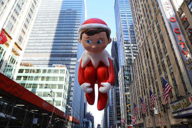 the elf on the shelf balloon is led down sixth avenue just in time for the holiday season during the 91st macys thanksgiving day parade in new york, nov 23, 2017