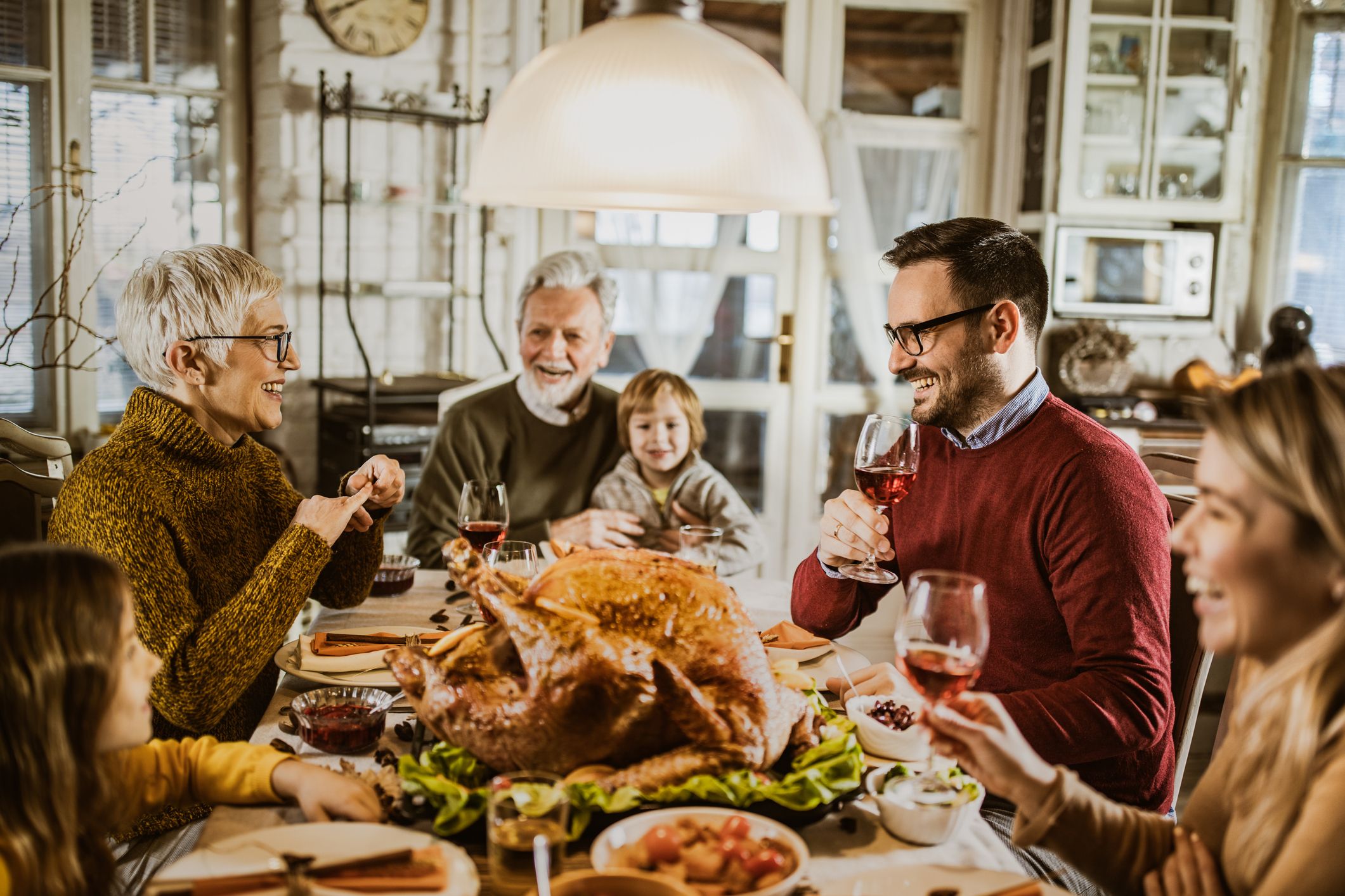 As I stand here washing dishes from the Thanksgiving meal, I realize that  living in America with a healthy family and happy friends, God…