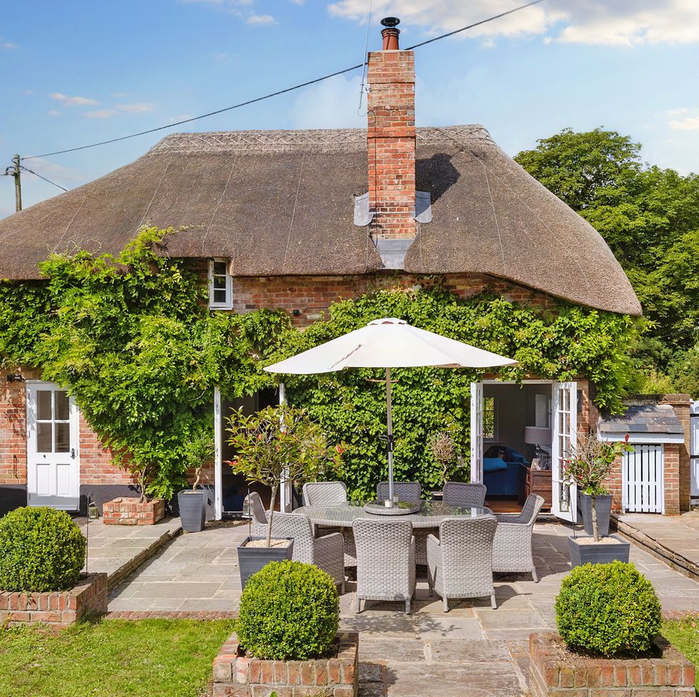 thatched cottage for sale garden