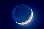 four day old moon with earthshine