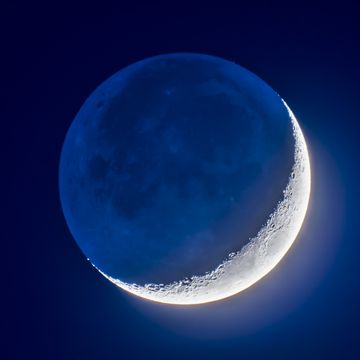 four day old moon with earthshine