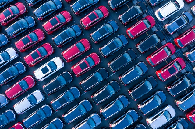 The aerial photograph of the outdoor warehouse of the new car.