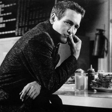 Paul Newman Leaning On A Table