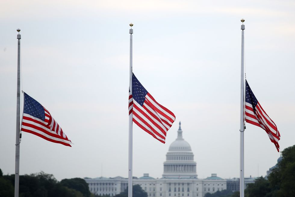 Flags Fly At Half Staff In Washington DC For Mass Shooting Victims