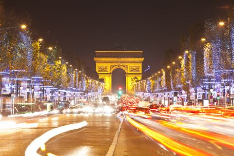 the arc de triomphe and champs elysees at christmastime