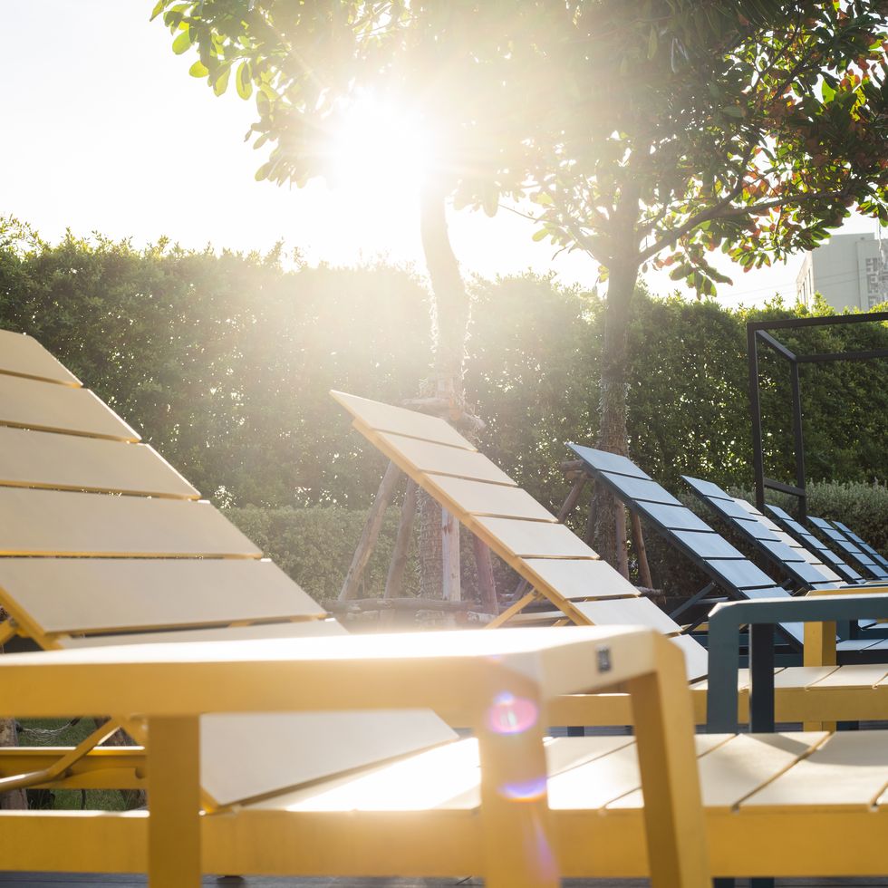 the beach chair at the swimming pool in the morning