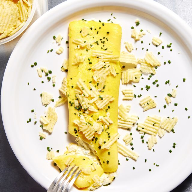 boursin omelet with sour cream onion potato chips sprinkled on top with chives