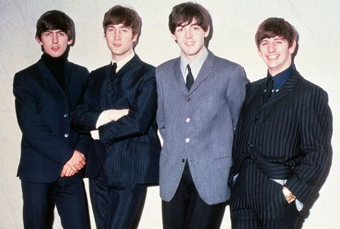 the beatles posing together