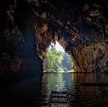 the beauty of the walls inside the cave is water flowing through is popular with tourists in mae hong son, unseen thailand, tham lod cave, one of the most amazing caves in thailand.