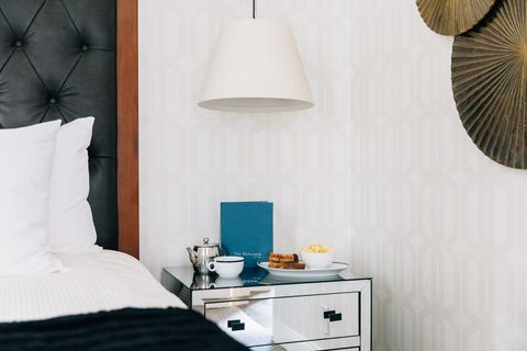 White, Room, Blue, Bedroom, Furniture, Interior design, Property, Lampshade, Wall, Nightstand, 