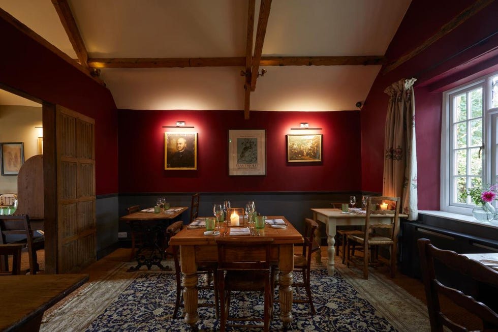 a room with tables and chairs