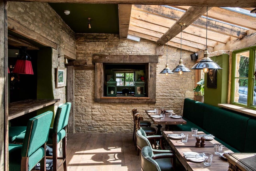 a restaurant with tables and chairs