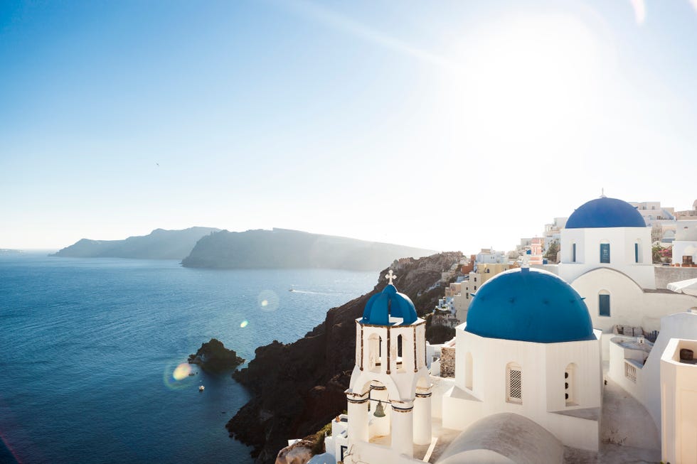 the blue church domes of oia, santorini