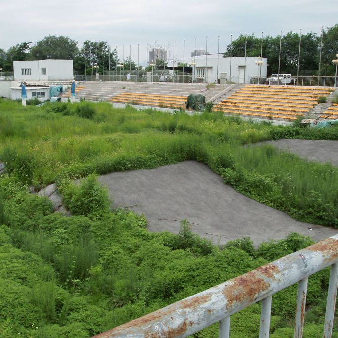 the bmx stadium for the beijing 2008 olympic games  is abandoned and is now rent by an automobile sales company 07aug13