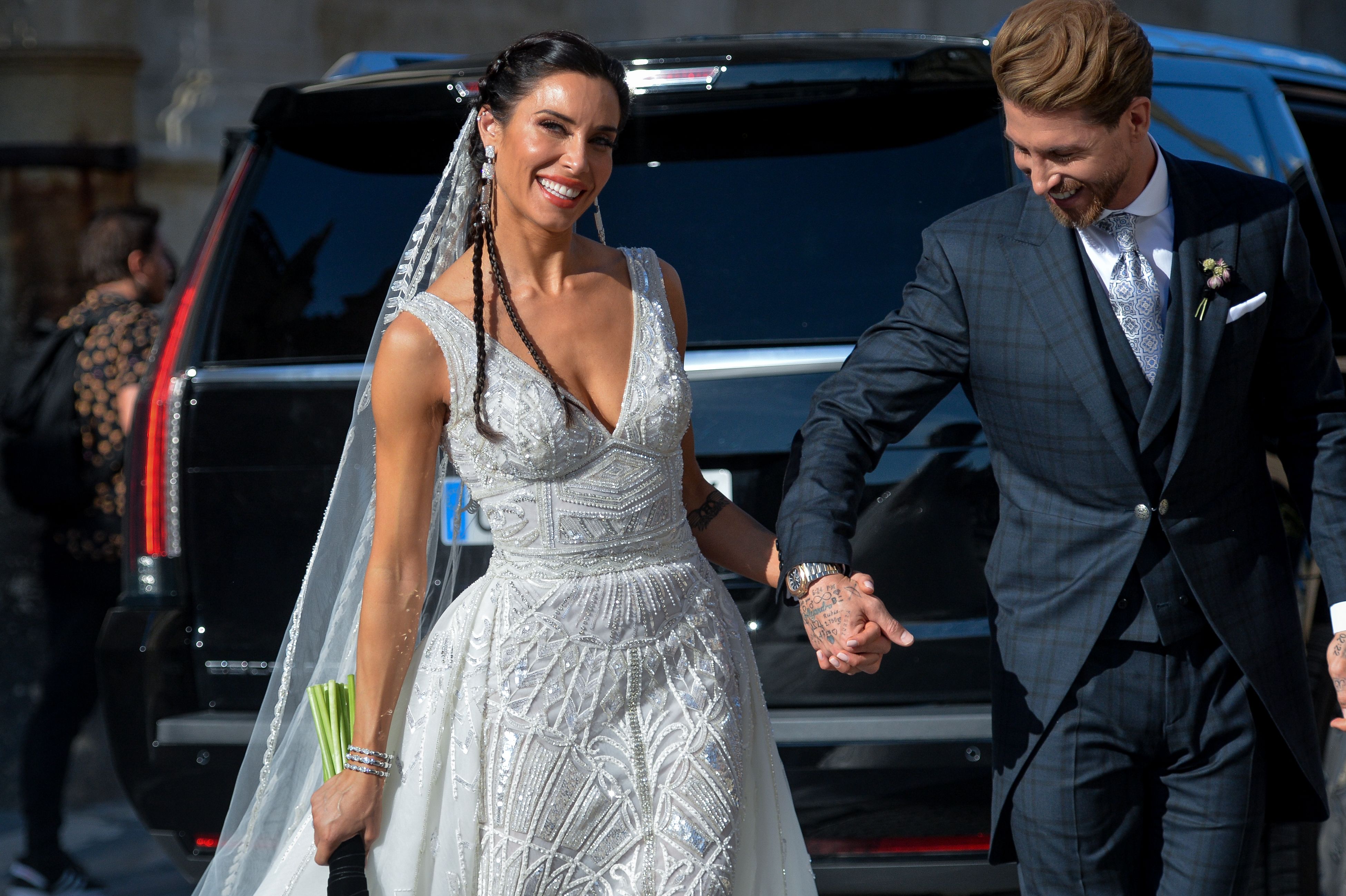 Entrenadores invitados a la boda de Sergio Ramos y Pilar Rubio - Vikika y  Noe Todea en la boda de Pilar y Sergio