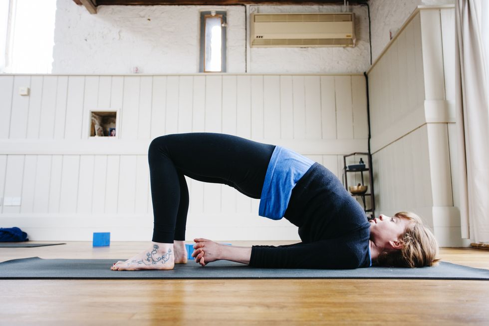the bridge position, yoga class, exercise studio