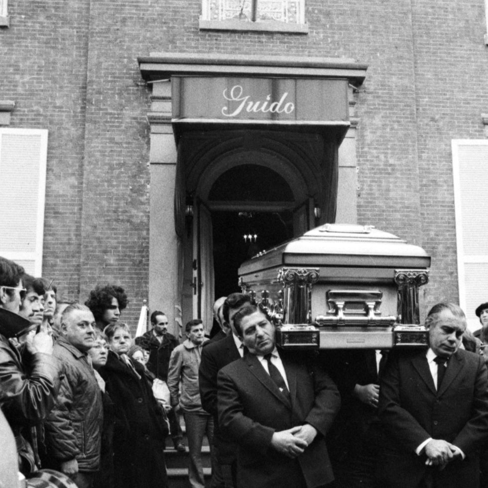 The casket containing legendary gangster Joey Gallo exits Gu