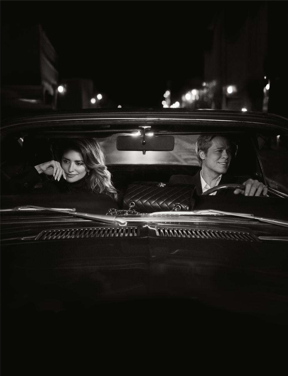 a man and woman in a car