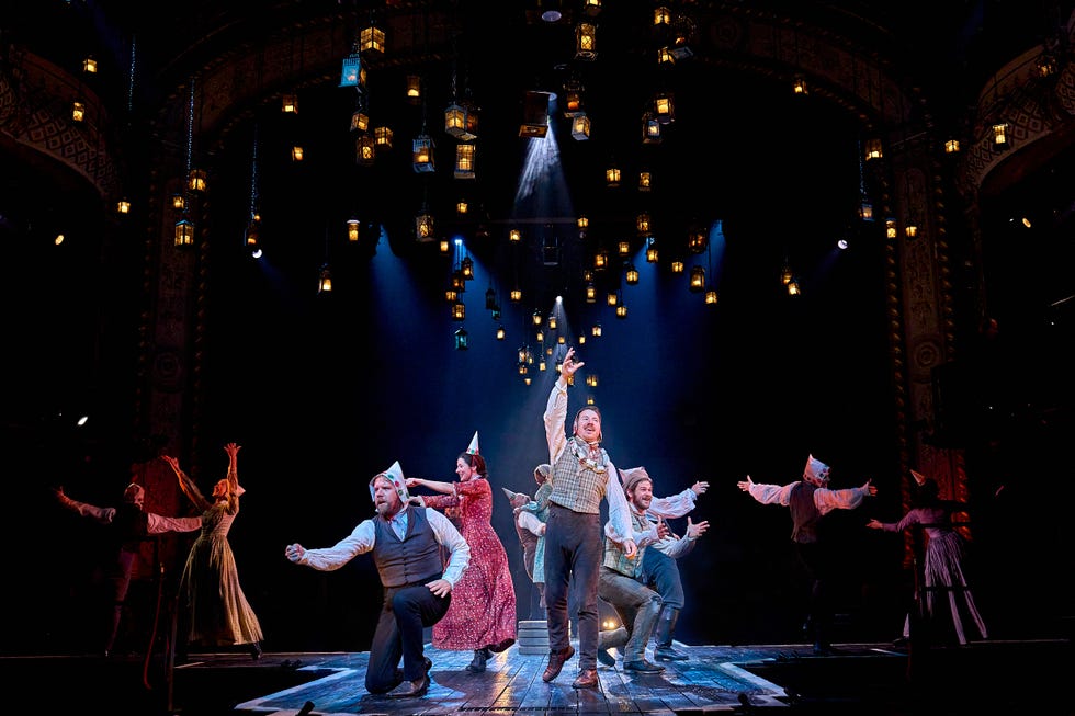 theatrical performance with multiple dancers on stage