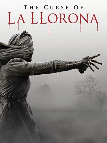 the poster for the curse of la llarona, featuring a  ghostly woman with a shrouded face pointing off in the distance it is currently the sixth movie if you want to watch all of the conjuring movies in chronological order