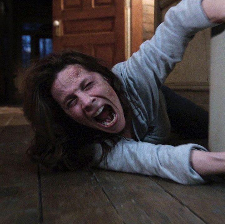 carolyn perron screams from the floor in a scene from the conjuring a good housekeeping pick for best halloween movies