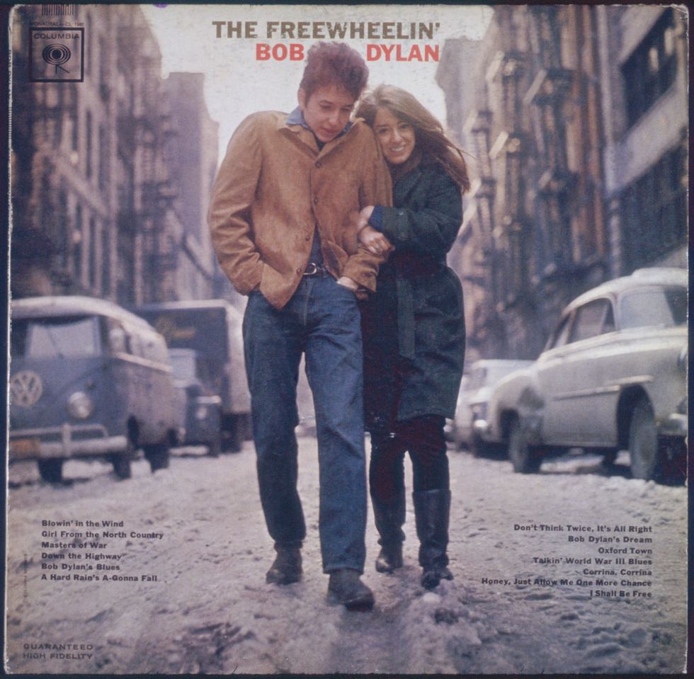 A vinyl album cover featuring Bob Dylan and his girlfriend walking down a snowy street