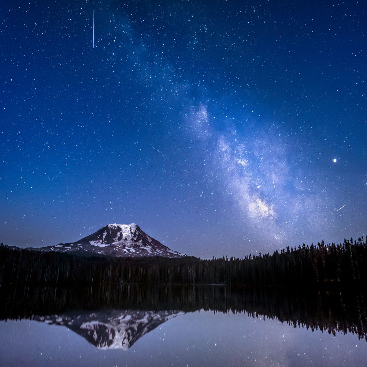 the delta aquariids meteor shower and milky way over mt adams at lake takhlakh, washington state