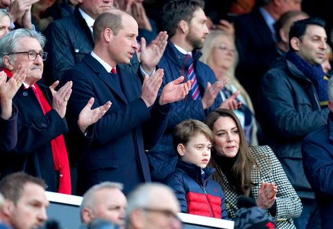 the duke and duchess of cambridge and prince george in the stands at twickenham stadium, london