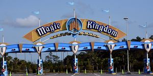 the entrance to the magic kingdom at disney world is seen on