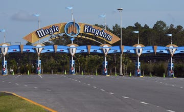 the entrance to the magic kingdom at disney world is seen on