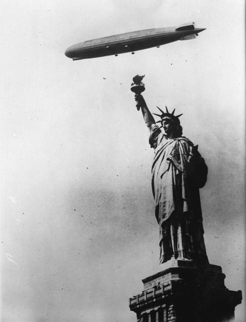 The famous airship 'Graf Zeppelin' flies over the Statue of Liberty. New York City. Photograph. Around 1930.  (Photo by Austrian Archives (S)/Imagno/Getty Images)