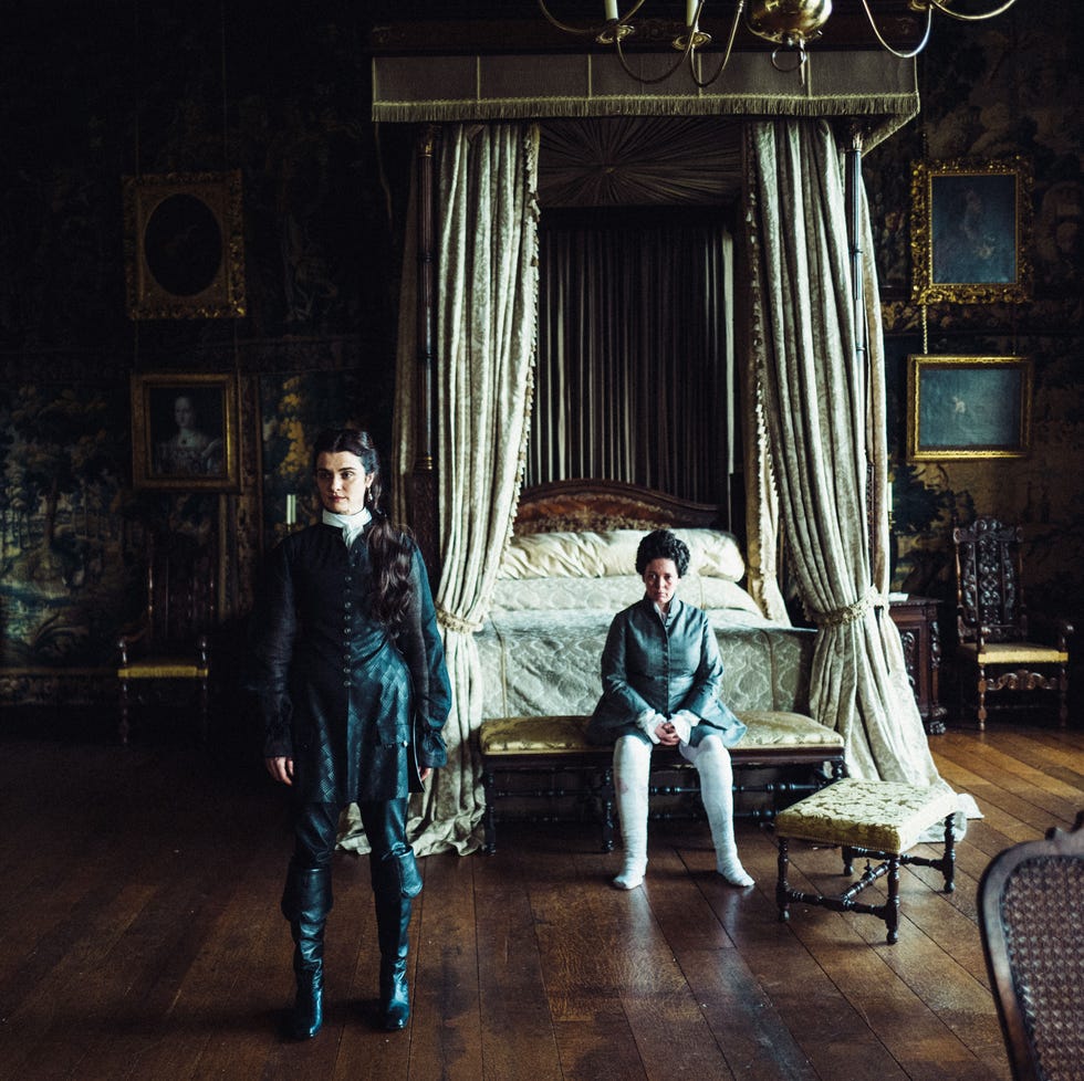 Olivia Colman (sitting) as Queen Anne and Rachel Weisz as Sarah Churchill, Duchess of Marlborough