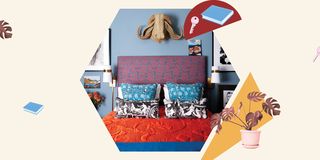 the first apartment bedroom, blue painted walls, red and blue headboard, decorative pillows, wall decor