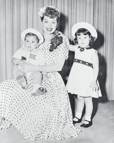 performer lucille ball posing with her children