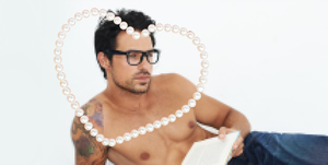 an attractive, shirtless man wearing glasses