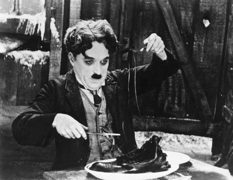 charlie chaplin in the shoe eating scene from the gold rush