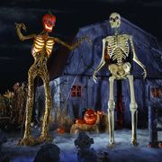 the home depot home accents holiday 12 foot giant sized inferno pumpkin skeleton and skeleton with lifeeyes