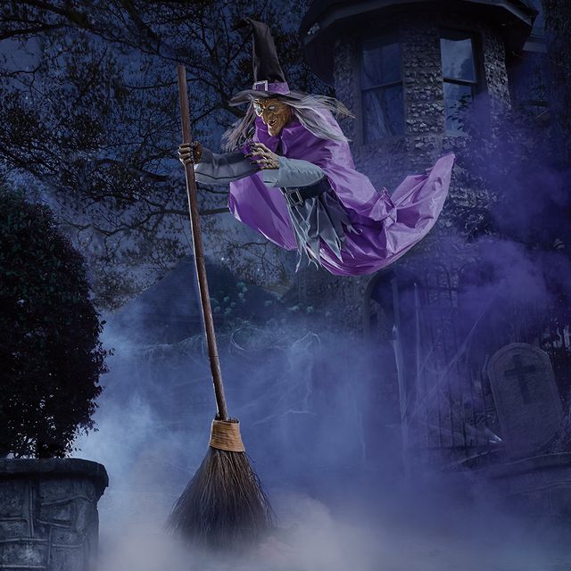 This 12-Foot Animated Witch Decoration Looks Like It’s Hovering Over ...