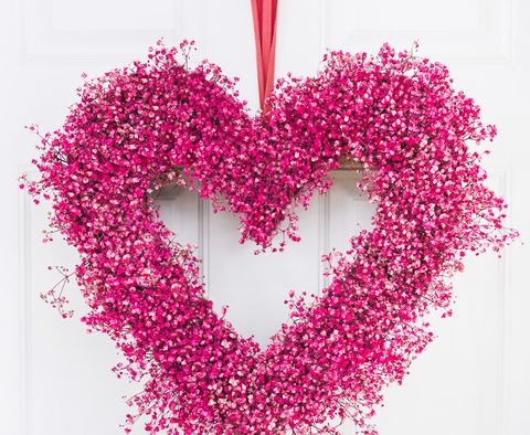 heart shaped wreath made out of baby's breath painted bright pink