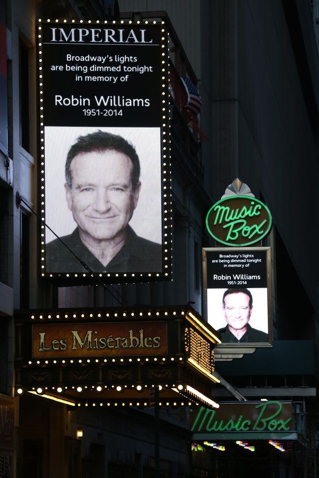 theater marquees displaying a photo tribute of robin williams