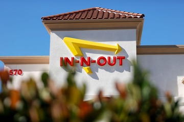 in n out burger clashes with local governments over vaccine verification mandates
