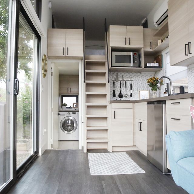 https://hips.hearstapps.com/hmg-prod/images/the-interior-of-a-tiny-house-with-large-glass-royalty-free-image-1577997502.jpg?crop=0.667xw:1.00xh;0.330xw,0&resize=640:*