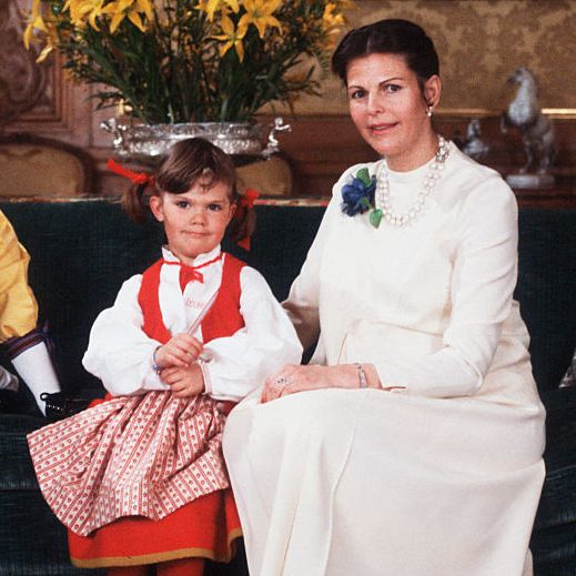 the king and queen of sweden with their two children
