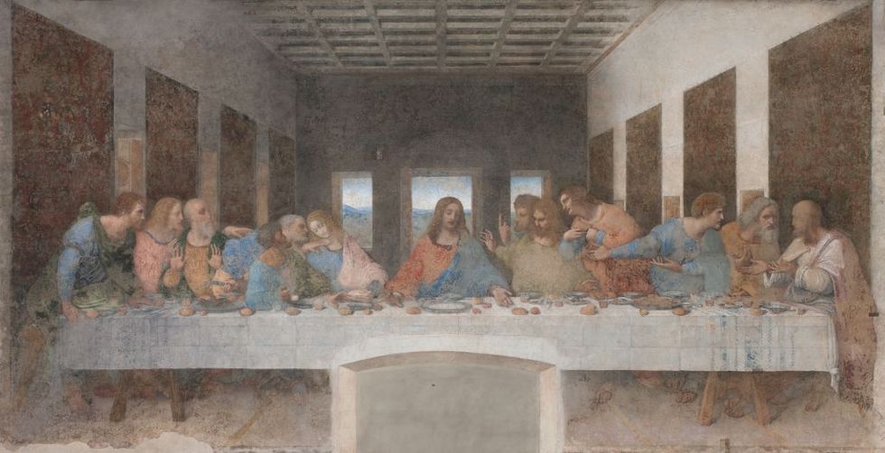 a painting of 13 men including jesus christ in the middle around a long table set with food