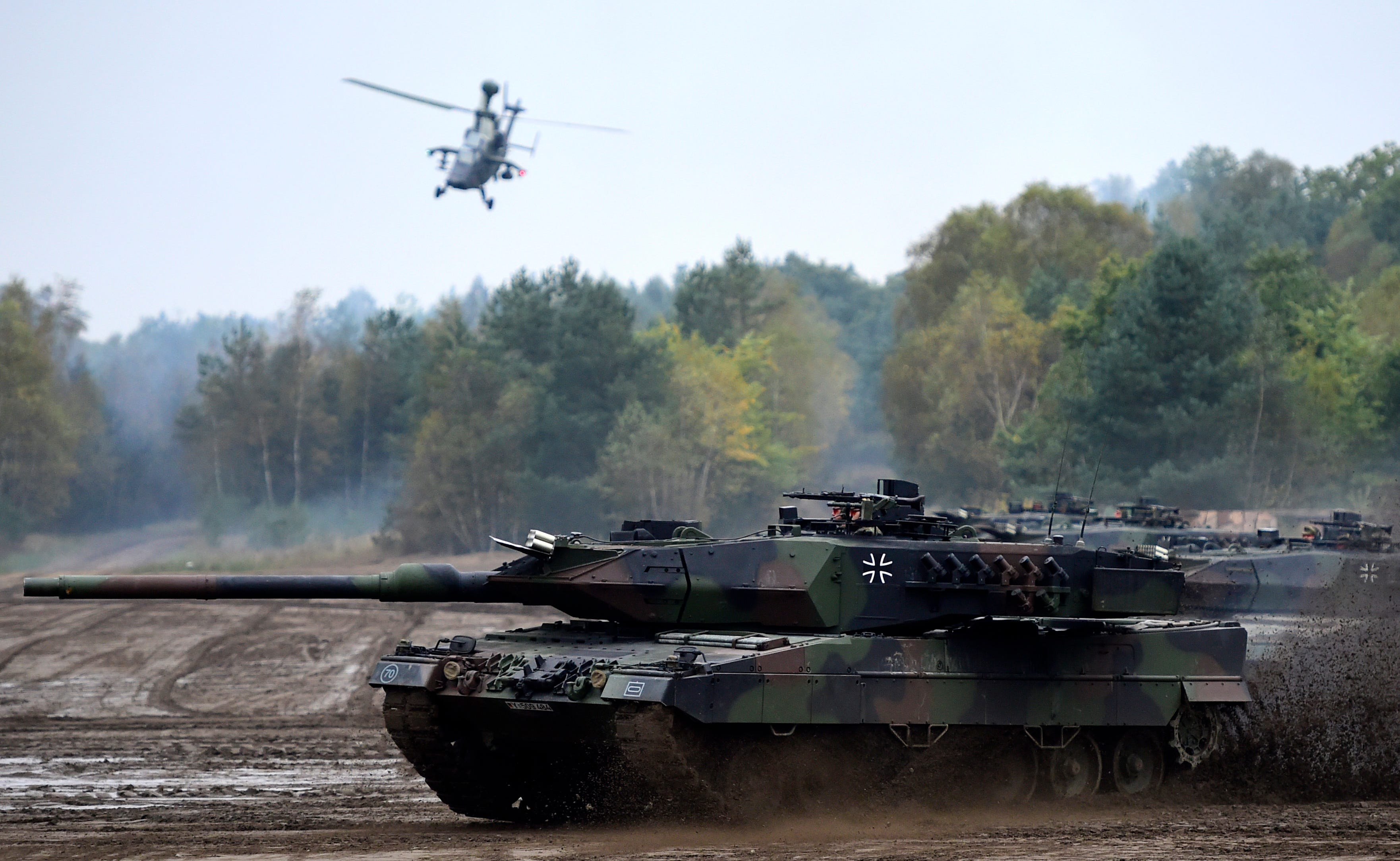 the-leopard-2a6-tank-and-the-tiger-helicopter-of-the-news-photo-1666205681.jpg