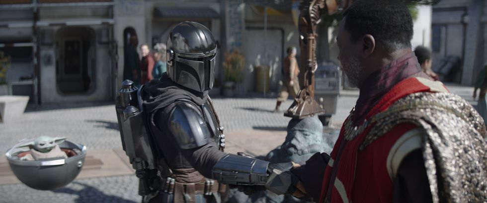 l r grogu, din djarin pedro pascal and greef karga carl weathers in lucasfilm's the mandalorian, season three, exclusively on disney ©2023 lucasfilm ltd tm all rights reserved